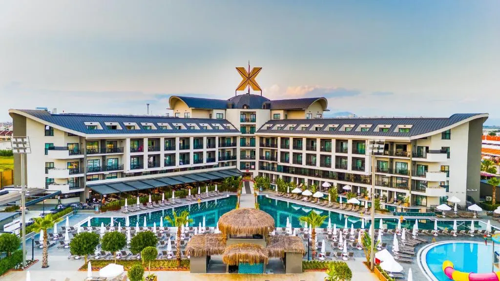 Resort facade and pool at The X Belek, Antalya water park hotel