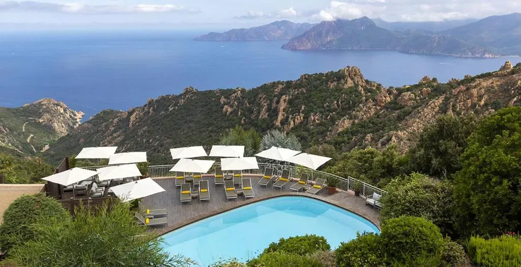 Pool at Hôtel Capo Rosso with Calanques de Piana views