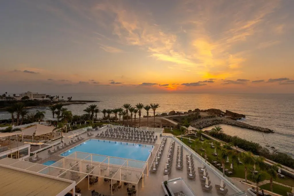 Queens Bay Hotel exterior overlooking Coral Bay beach, Paphos