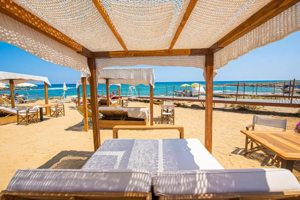 Pietrablu Resort & Spa — main outdoor pool complex with palm trees in Polignano a Mare, Puglia