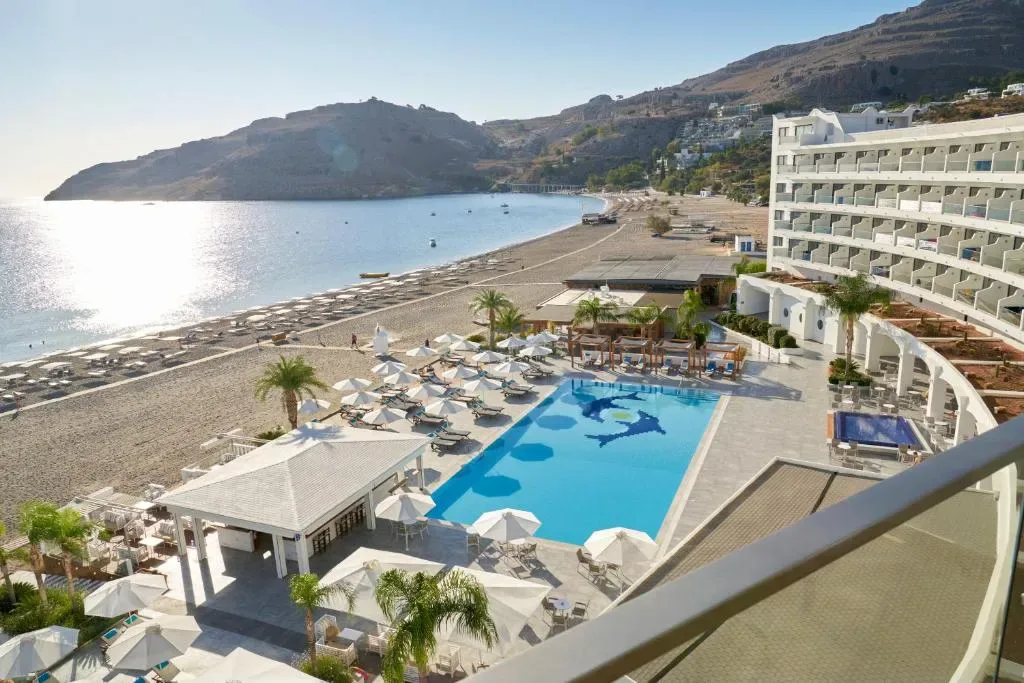 Lindos Bay Hotel pool and sea view in Vlyha Bay, Rhodes