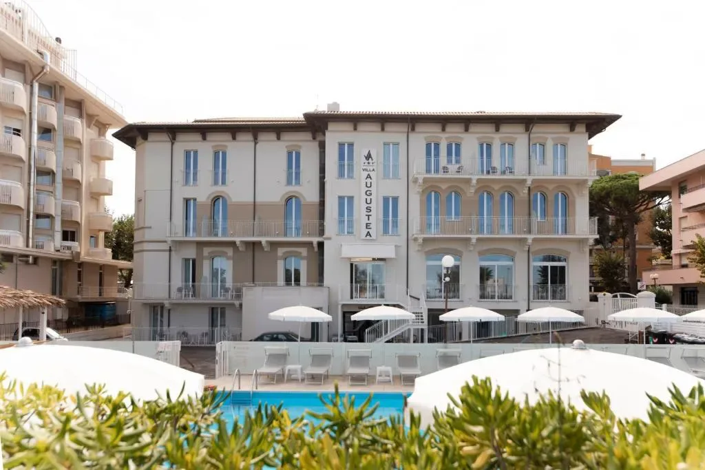 Hotel Villa Augustea facade and pool area in Rimini