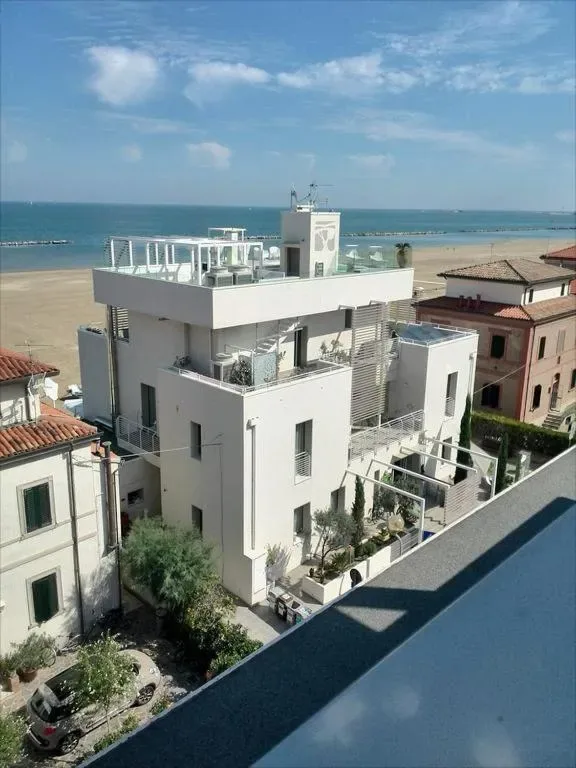 Hotel Madalù beachfront facade in Viserba, Rimini