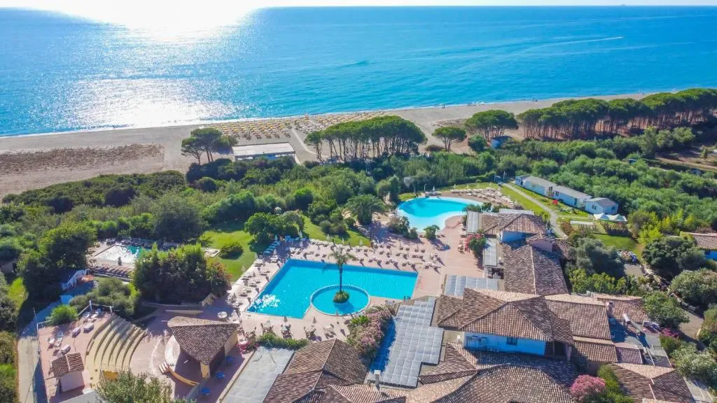 Perdepera Resort aerial view with pools and beach, Sardinia
