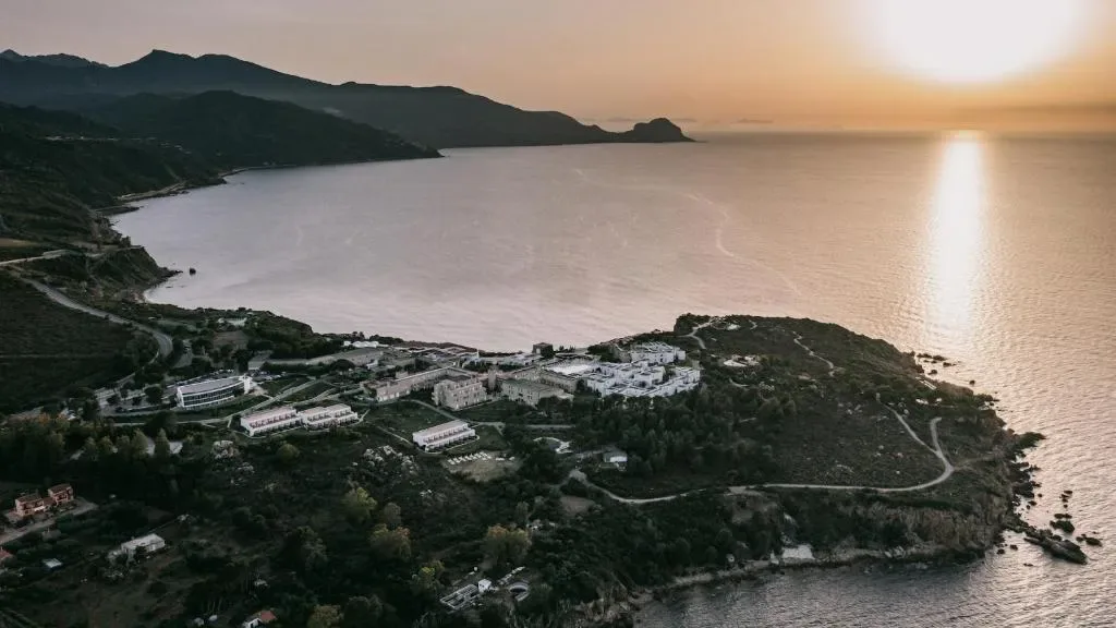 Aerial view of Mangia's Pollina Resort on the Sicilian coast