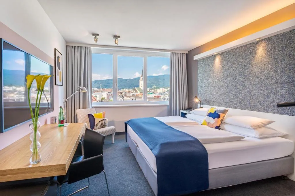 voco Villach by IHG - Hotel de 4 estrellas en Villach, Villach - photo 1