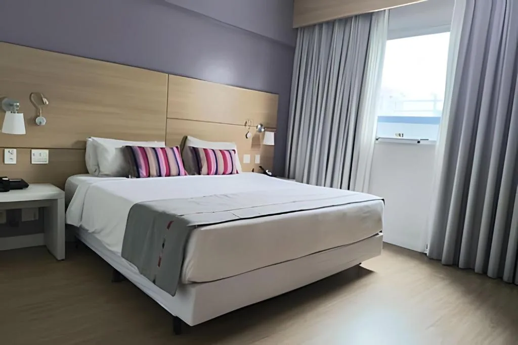 Suíte em flat no Gonzaga Stay Helbor