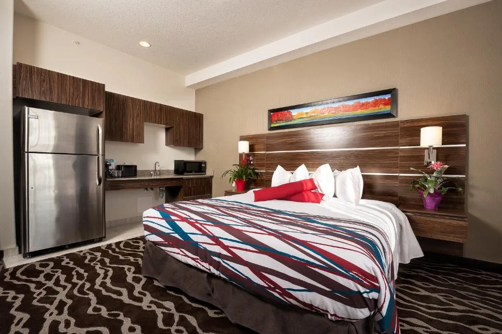 Encore Suites by Service Plus Inns — 4
