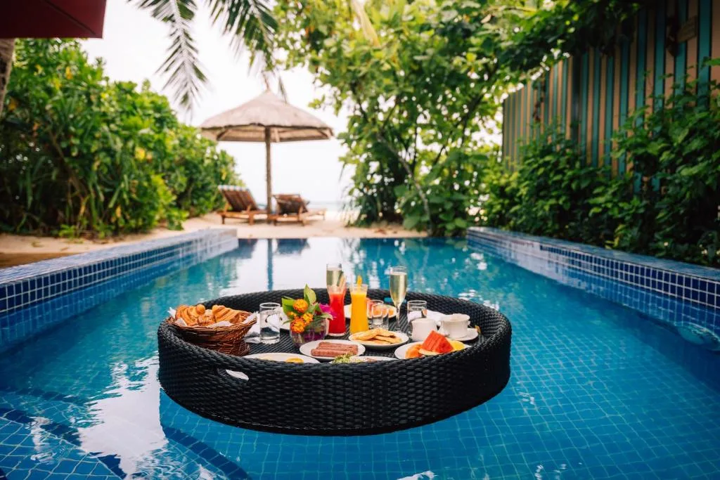Reethi Faru Resort - Stay 5 Nights or More and Enjoy a Free Sunset Cruise — 5