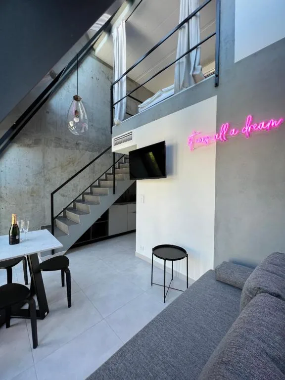 NEON APARTMENTS — 3